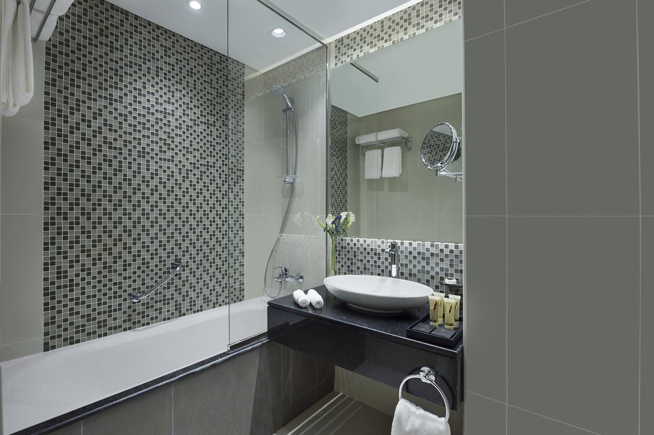 Three Bedroom Suite with Private Balcony - City Skyline View